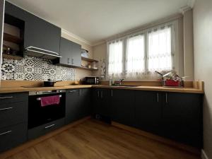 Appartements Familial Apartment - Troyes : photos des chambres