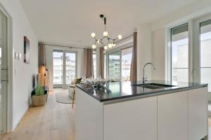 Huswell - Bright, modern apartment with terrace near beach