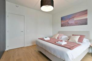 Huswell - Bright, modern apartment with terrace near beach