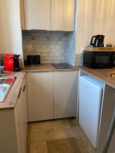 Appartements Tres beau studio avec terrasse : photos des chambres