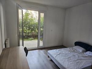 Appartements Appartement lumineux avec jardin et terrasse proche stade JO : photos des chambres