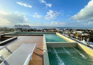 Brand New Condo with Rooftop Pool - 4hvězdičkové hotely ve městě Cozumel