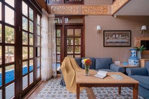 SaffronStays Tudor San Ann - 5BR Candolim villa with infinity pool, lift & sunrise-view rooms near beach