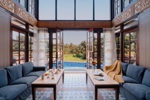 SaffronStays Tudor San Ann - 5BR Candolim villa with infinity pool, lift & sunrise-view rooms near beach