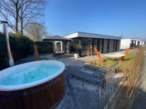 Luxe 4- persoons Veluwelodge met hottub in Ermelo!