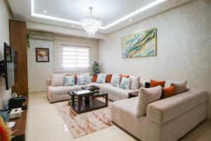 Appartement Cosy à Malabata Plage - Bord de mer et Gare TGV 3 à pied, Tanger City Mall à 2 à pied - Parking, WIFI, IPTV, AC