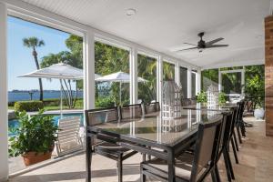 Palma Sola Bay House! Private Dock, Heated Pool & Spa, Game Room & More!
