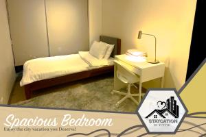 Luxurious 2 Bedroom Family Suite plus Maid Rm in Eastwood City