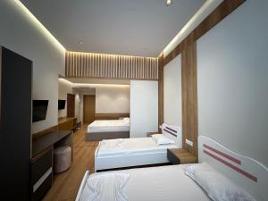 Standard Quadruple Room room in Coli's Hotel