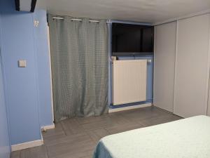 Sejours chez l'habitant Chambre dans maison pres du stade de France et piscine olympique : photos des chambres