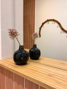 Appartements Home Chic Home - Les Suites de La Comedie : photos des chambres