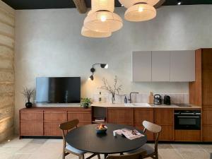 Appartements Home Chic Home - Les Suites de La Comedie : photos des chambres