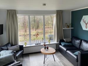 Chalet de Bosrand 404, unieke rustige plek met veel privacy aan de bosrand van vakantiepark op de Veluwe