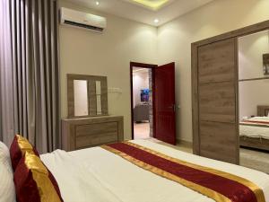 شقة فاخرة غرفتين وصالة ارضية و مدخل مستقل النرجس 11