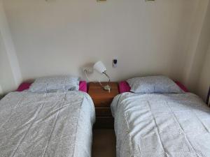 Apartamento con Patio y salida a la piscina.