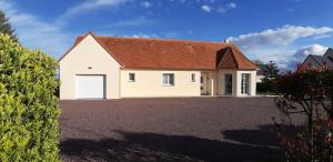 Gîte "Au Ptit Tourois" de plain-pied tout confort avec véranda proche dOmaha Beach et de Bayeux accueillant les animaux