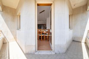 Beach Flat by House and People