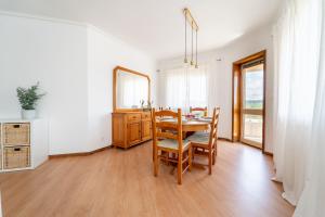 Beach Flat by House and People