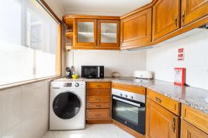 Beach Flat by House and People