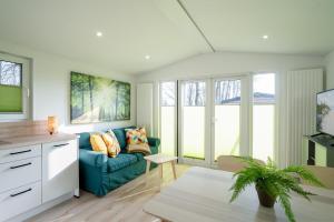 Ostseecamp Ferienhaus "Wiesenblick"