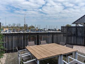 Holiday Home in Sneek with Waterfront Jetty