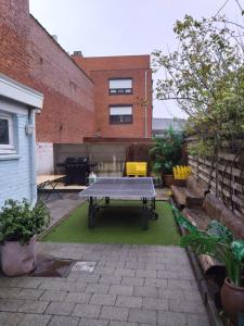 Vakantiewoning in Mol centrum met eigen bar "CasaCuriosa"