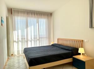 Villa Emy Fronte Mare-Carraro Immobiliare Jesolo-Family Apartments