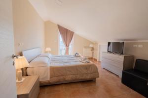 Two-Bedroom Suite with Balcony room in Le camere di corte