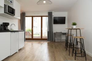 Appartements Appart cozy renove proche gares, balcon & parking : photos des chambres