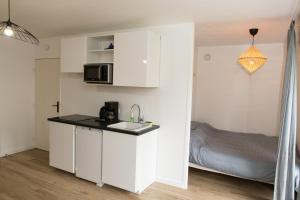 Appartements Appart cozy renove proche gares, balcon & parking : photos des chambres