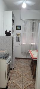 Apto no Embaré pé na areia