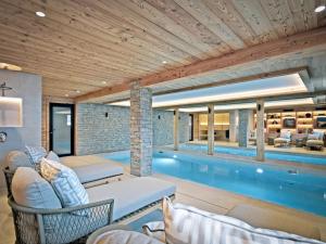 Chalets Chalet luxueux avec piscine interieure et sauna - 5 chambres, 12 pers., proche commerces et pistes - FR-1-613B-44 : photos des chambres
