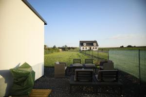 Maisons de vacances Magnifique Maison de plain-pied Neuf : photos des chambres