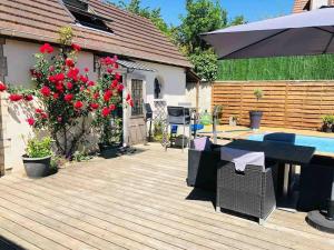 Maisons de vacances Guest House proche Disneyland Paris Piscine ouverte en saison estivale : photos des chambres