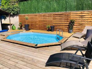 Maisons de vacances Guest House proche Disneyland Paris Piscine ouverte en saison estivale : photos des chambres