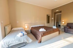 Habitación Cuádruple Deluxe con balcón