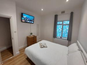Cosy North Kensington Family apartment for 4 persons - Children stay free Netflix inbedrooms Close to underground and overground stations - very convenient for Wembley Stadium