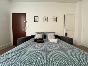 Appartements Le Studio Noir et Blanc : photos des chambres