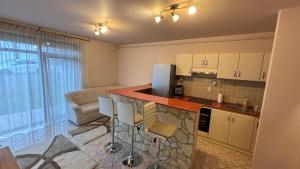 Makra-tető Öregtölgy Apartman