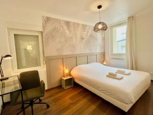 Appartements Florea Reims avec du charme proche gare et centre : photos des chambres
