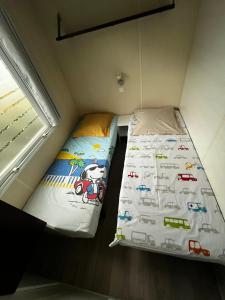 Chalets Entre Mer et Roseaux - Piscine - Proche centre et mer - Petfriendly : photos des chambres