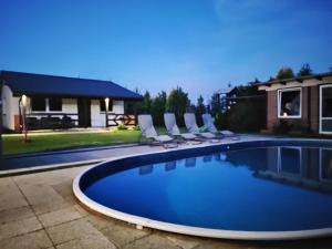 obrázek - Comfortable holiday homes, swimming pool, Rewal