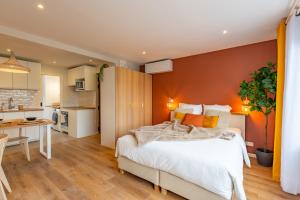 Appartements Studio Delorme : photos des chambres