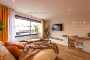 Appartements Studio Delorme : photos des chambres