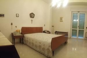 Appartamento 16 letti con cucina e parcheggio privato gratuito