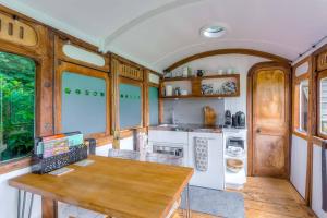 Railway Carriage accommodation with tennis court!