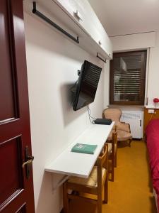 Appartamento per Famiglie in Centro ad Asiago con Posto Auto e Ampio Giardino