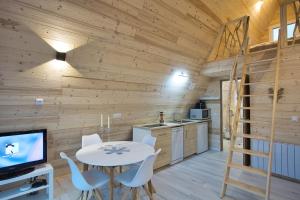 Chalets Chalet Atypique, a 10km de Gerardmer : photos des chambres