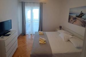 Apartments by the sea Postira, Brac - 22197