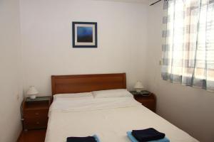 Apartments with a parking space Postira, Brac - 22664